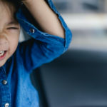 Tantrum and Aggressive little girl punch on camera.Mad kid got upset and sad and she has a negative attitude.Depressed little girl complaining.Attention deficit hyperactivity disorder (ADHD) Concept